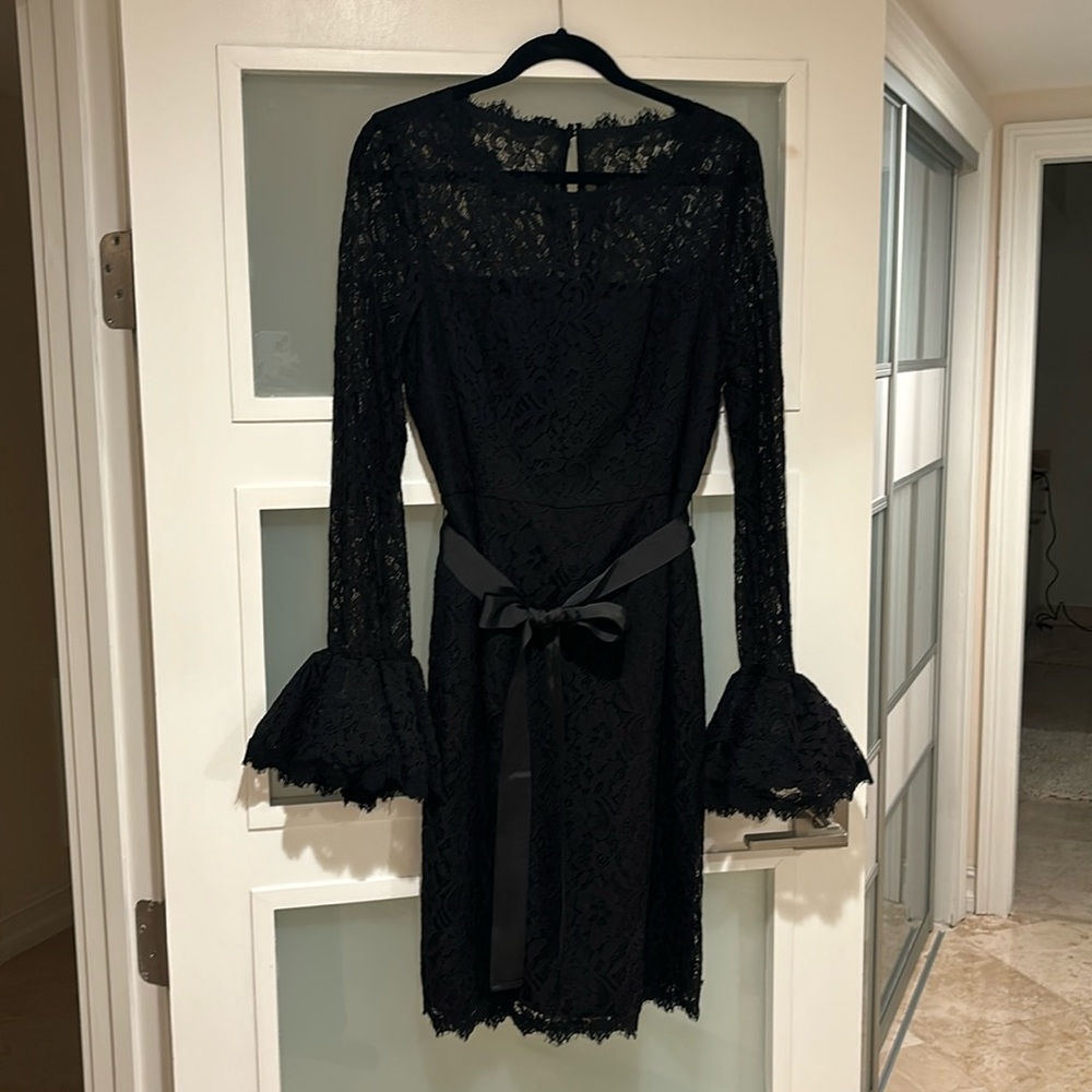 Very elegant cocktail dress. Ruffle Sleeve Lace Sheath dress